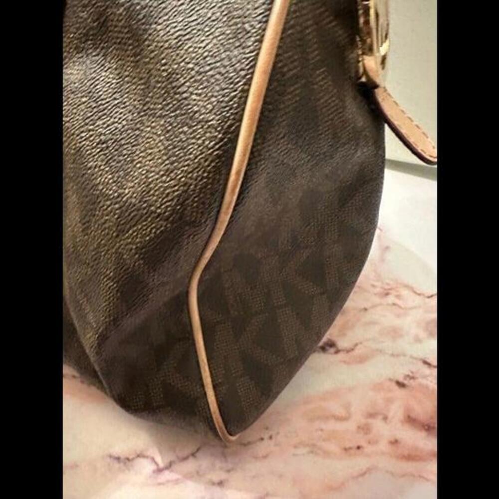 Elevate Your Everyday Look w/ the Gently Loved Michael Kors Brown Monogram Bag - Picture 4 of 10
